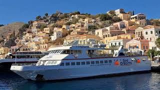 Arriving by boat at Symi harbor in Greece!