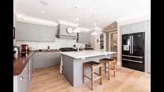 Plain English Kitchen with island, utility and worktops.