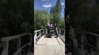 Japanese Group enjoying tractor trolley tour from Gulmit to Gulkin