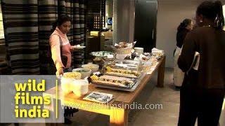 Passengers wait for their flights at a Jet Airways Lounge in India