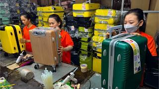 Satisfying mass production of suitcases. Efficient Vietnamese workers produce lightweight suitcases.