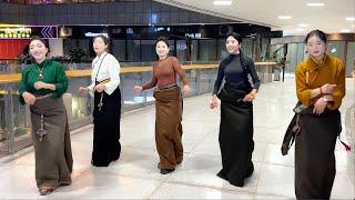 Beautiful Tibetan women happily enjoying Tibetan Disco