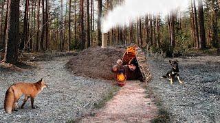 Building a warm and cozy dugout in the shape of a dome. Survival skills