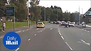 Dashcam video shows police car running a red light in Lancashire - Daily Mail