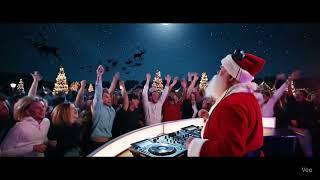 "Santa Spins the Night Away—'Drop the Beat!' in a Sea of People"