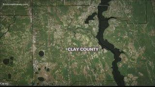 Officials investigating after body was found in Clay County pond