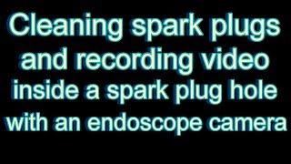 cleaning spark plugs and recording video inside spark plug hole with endoscope