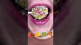 Strawberry jawbreaker tough candy shell hiding sweet berry bursts