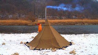 Awesome camping with a wood stove by the snowy riverside...First time using the POMOLY X Ti-5.