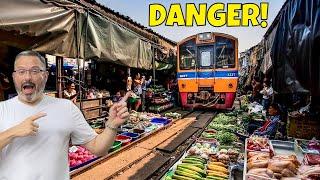 Thailand's Craziest Market Runs On ACTIVE Train Tracks