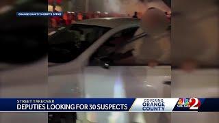 Deputies searching for 30 suspects involved in chaotic street takeover in Orange County