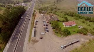 Terreno em Sombrio na BR 101 com Casa e Restaurante.