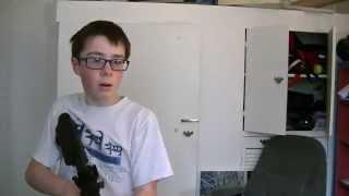 KID SHOOTS SCREEN WITH AIRSOFT GUN