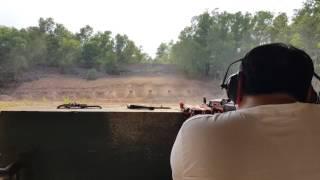 Firing AK47 in Cu Chi Tunnels Ho Chi Minh Saigon