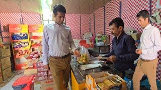 Akbar helped a homeless lady and bought some pistachios from her and gave her money to buy a tent.