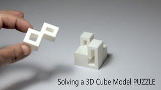 Solving a four piece cube puzzle