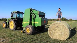 Working on the farm with tractors | Baling hay for kids | Round baler