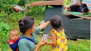 Single mother - raising children by herself, gardening, cooking porridge for her children to eat