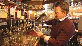 Graeme McDowell pours a perfect pint of Guinness