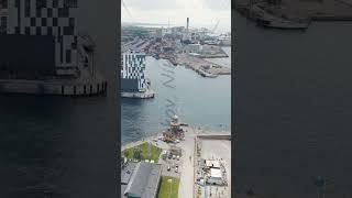 Vertical video. Helsingborg, Sweden. Electric ferry Aurora of the ferry company ForSea at the pie...