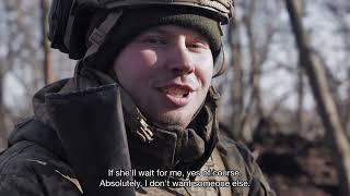 Ukrainians take cover from rain of bullets flying over their heads