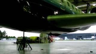 Landing gear being raised & lowered in hangar