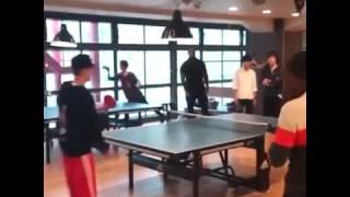 Justin Bieber playing ping pong