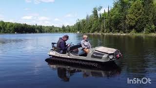 Argo Avenger 8x8 with 20 in tracks and trolling motor in lake