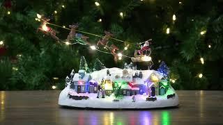 LED Lighted Christmas Village with a Flying Sleigh - NORTHLIGHT XH90623