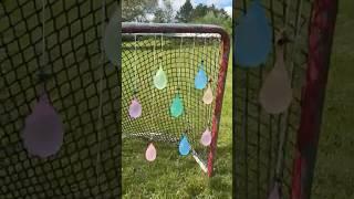 Water Balloons as Targets                    #hockey  #hockeylife #trickshot #waterballoon