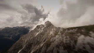 Mountain surfing in the clouds | 4K Cinematic FPV