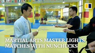 Chinese nunchuck master swings at matches and candles to topple Guinness World Records