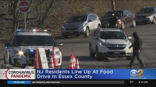 NJ Residents Line Up At Food Drive In Essex County