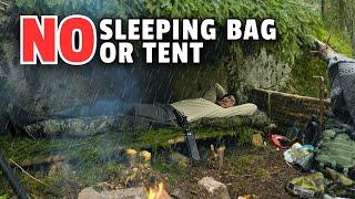 SURVIVING a night in a BUSHCRAFT shelter (rain got me)