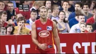 Who is this guy? Help me find him! Guy picks nose on telly at the footy (AFL)