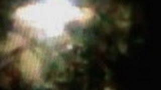Aliens outside their Sparkling UFO