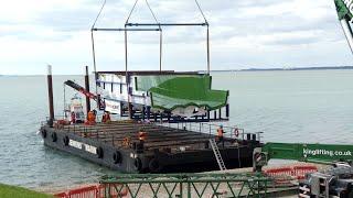 Princess motor yacht mould lifted onto a barge at the slipway Lee on Solent. Friday 4th October 2024