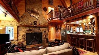 Unique log home on 11+ private acres