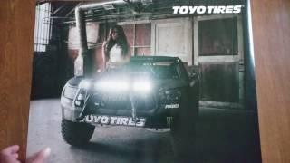 KYRA KELI IS TOYO TIRES MODEL SIGNS POSTER FOR JW BURRELL SIDE B