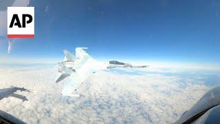 Video shows Russian jet flying within feet of US F-16 near Alaska