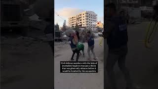 Civil defence & journalists rushes to evacuate civilians moments before  Israeli airstrike in Gaza