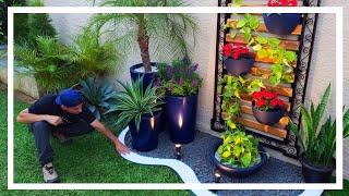 Beautiful decor with blue pots and vertical garden