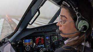 Extremely Weather Conditions. Beautiful Female Captain Landing Her Airplane.