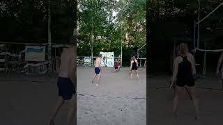 Beach volleyball, a long throw of the ball down the center.