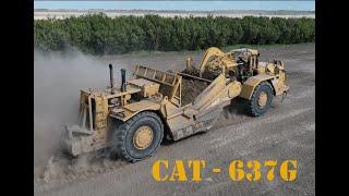 CAT 637G - Loading to Unloading Alberta gravel pit, overburden