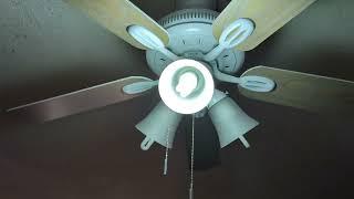 broken fluorescent lights screwed into a ceiling fan for them to burn out On video 