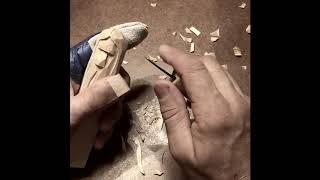 Whittling a wood spirit out of basswood