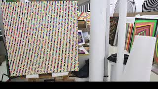 Ron Agam in his studio painting during the pandemic