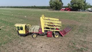 Stacking Alfalfa Hay in Northern California New Holland Bale Wagon Drone View 