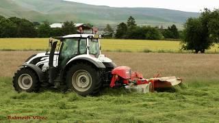 Mowing for Silage or Hay - the White Valtra.